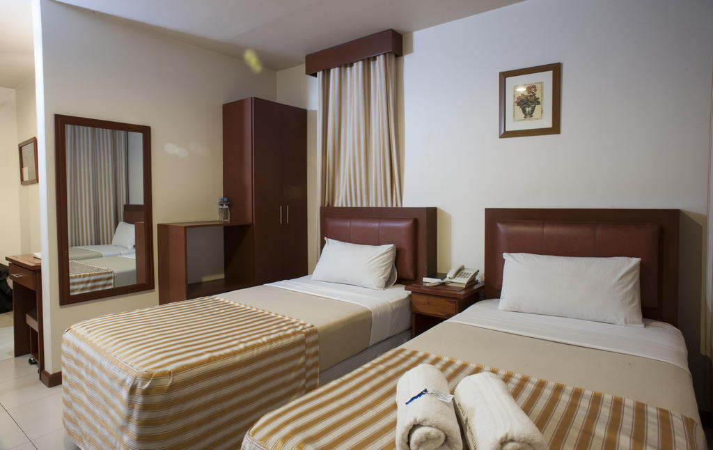 Hotel Cosmopolitan Багио Номер фото